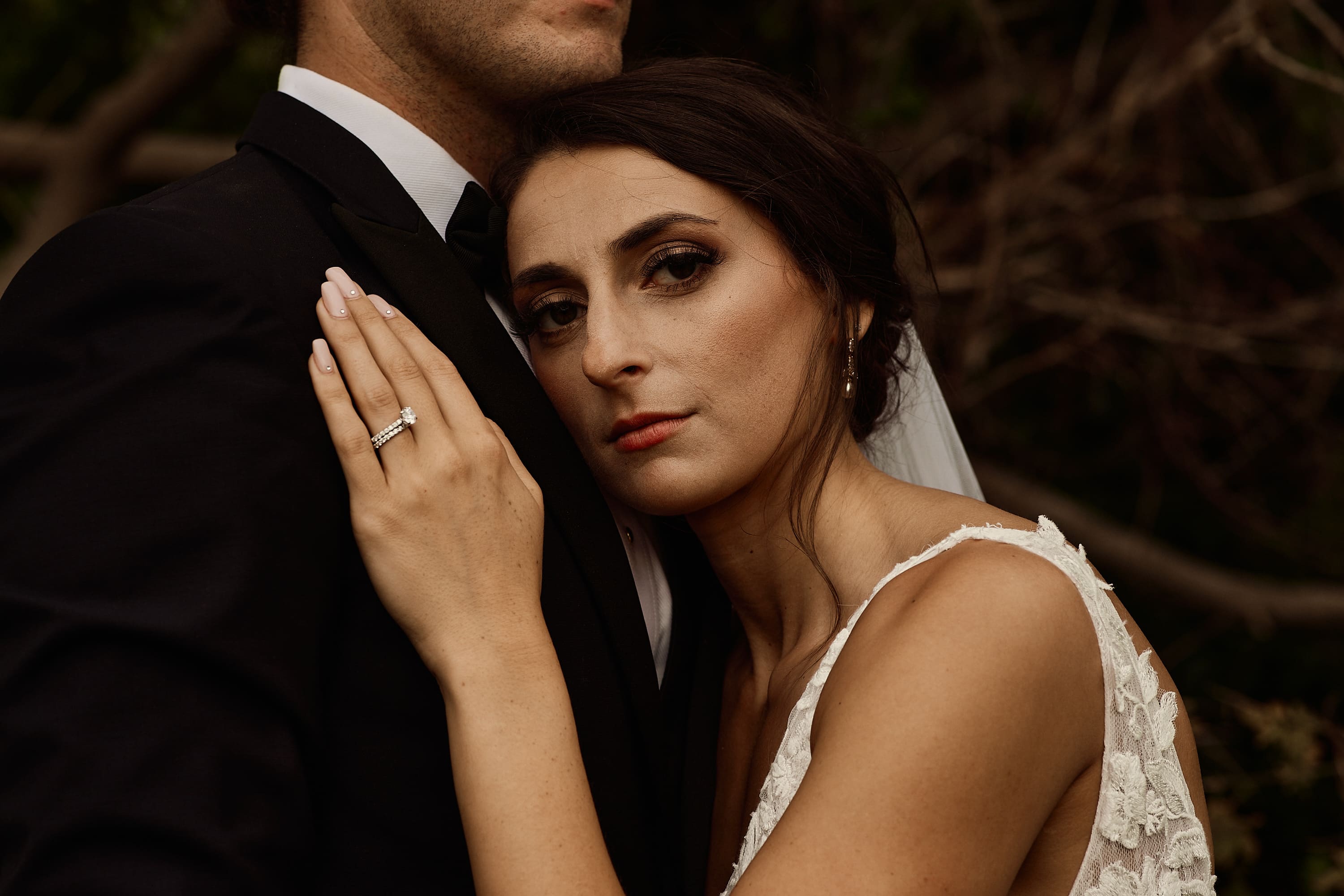Intimate close up portrait of a couple in moody lighting